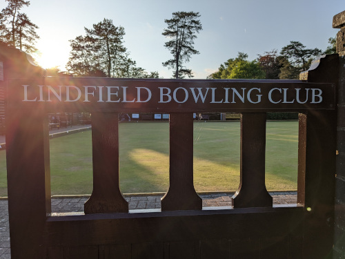 Club sign at sunset